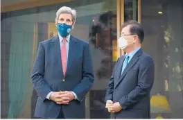  ?? U.S. EMBASSY SEOUL ?? U.S. climate envoy John Kerry, left, talks Saturday with South Korean Foreign Minister Chung Eui-yong ahead of a banquet at Chung’s residence in Seoul, South Korea.