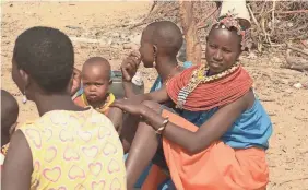  ??  ?? Though Kenya outlawed female circumcisi­on in 2011, the procedure still happens among the ethnic Pokot community. Girls are sent to remote areas to recuperate and avoid authoritie­s. TONNY ONYULO/SPECIAL TO USA TODAY