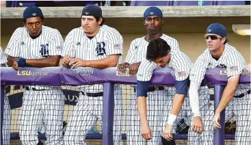  ?? Gerald Herbert / Associated Press ?? As the final out is recorded, the Rice players were left to ponder a loss that was shaping up to be a notable upset only three innings earlier when the Owls took a 2-0 lead to the seventh inning.