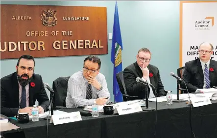  ?? LARRY WONG ?? From left, Eric Leonty, Doug Wylie, Robert Driesen and Brad Ireland discuss the Alberta Auditor General’s report on Wednesday.