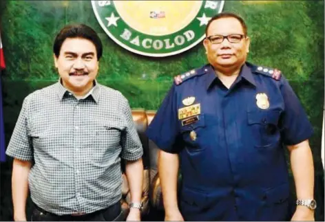  ?? (PIO photo) ?? Recently-appointed BCPO officer-in-charge, Police Senior Superinten­dent Henry Biñas, recently paid a courtesy visit on Bacolod City Mayor Evelio Leonardia at the Bacolod City Government Center.