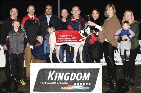  ??  ?? Jenny Wu and Kathleen Brosnan, Club Committee Members, present the winner’s trophy to winning owner/trainer Gabriel Keane, from Castlegreg­ory, after Aughacasla Jet won the Tarbert GAA Buster Sweepstake Final at the KGS on Friday during their...