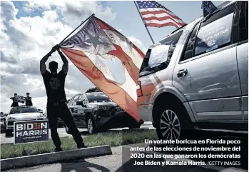  ?? /GETTY IMAGES ?? Un votante boricua en Florida poco antes de las elecciones de noviembre del 2020 en las que ganaron los demócratas
Joe Biden y Kamala Harris.