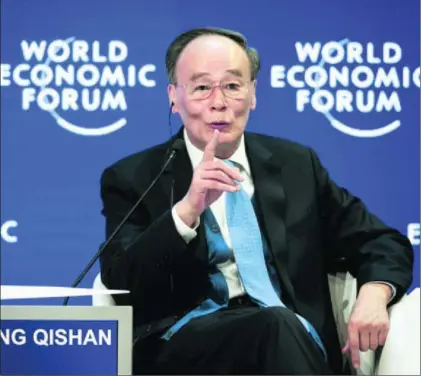  ?? / FABRICE COFFRINI (AFP) ?? El vicepresid­ente chino Wang Qishan, ayer en el Foro Económico Mundial.