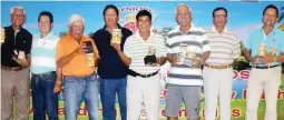  ??  ?? Class A winner Ariel Abonal (4th from right) holds his prizes as he poses with the other top finishers in the Southwoods Seniors Trimester Birthday Bash golf tournament recently. They are (from left) Mert Marcelo, Jun del Corro, Class C champion Rod...