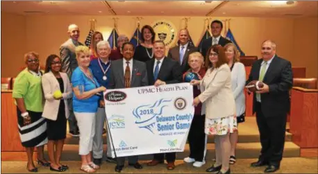  ??  ?? Senior athletes and sponsors helped Delaware County Council and the County Office of Services for the Aging (COSA) to announce the 2018 Senior Games which take place June 11-22. Pictured in front at a recent County Council meeting are Denise Stewart, COSA Director; Tara Johnson, UPMC; athletes Marlene Green, George Green and Ernie Brown; Councilman Mike Culp; Betty Brown; Kathy Norman, Always Best Care; Barb Nicolardi, Marc Manfre; Barbara Nicolardi, COSA Planner. Pictured in back: Councilman Brian Zidek; Beth Chapman; Maureen Long, UPMC; Vice Chair Colleen Morrone; Chairman John McBlain; and Councilman Kevin Madden.