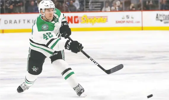  ?? MATTHEW STOCKMAN/GETTY IMAGES ?? Taylor Fedun of the Dallas Stars had to leave his wife and three-year-old son behind to join his team inside the “bubble” for the NHL playoffs.