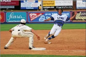  ?? AUSTIN HERTZOG - DIGITAL FIRST MEDIA ?? Oley’s Sebastian Williamson slides into third base for a triple during the District 3-AA baseball final on June 2.