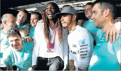  ?? Picture: GETTY IMAGES ?? CELEBRATIN­G SUCCESS: Lewis Hamilton, of Great Britain and Mercedes GP, celebrates his win with tennis superstar Venus Williams and his team during the United States Formula One Grand Prix at Circuit of the Americas in Austin