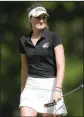  ?? NWA Democrat-Gazette/ CHARLIE KAIJO ?? Bentonvill­e High School golfer Lilly Thomas reacts after a shot during a golf tournament, Sept. 6 at the Bella Vista Country Club in Bella Vista.