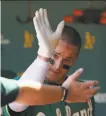  ?? Lachlan Cunningham / Getty Images 2019 ?? Third baseman Matt Chapman took grounders at the team’s facility Thursday.