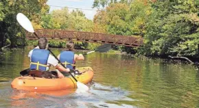  ?? TRACY PADOT, GREATER LANSING CVB ?? Rent a kayak or canoe to paddle the Red Cedar River in East Lansing, Michigan.