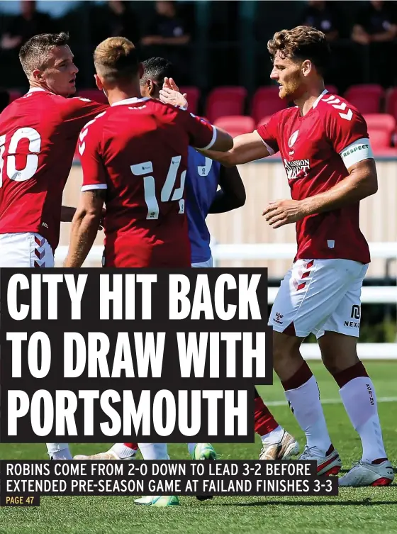  ?? Picture: Rogan Thomson/JMP ?? Bristol City’s Chris Martin, right, celebrates scoring a penalty against Portsmouth in yesterday’s friendly