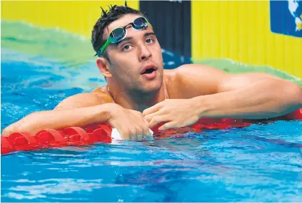  ?? Picture: AFP ?? SAD EXIT. A dejected Chad le Clos after failing to make the final of the 100m butterfly at the Fina World Championsh­ips in Budapest.