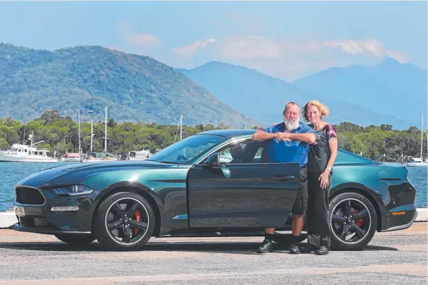  ?? Picture: ANNA ROGERS ?? HORSEPLAY: Wayne and Rhonda Leonard with their limited-edition Mustang Bullitt, the only one of the specially launched cars in Cairns.