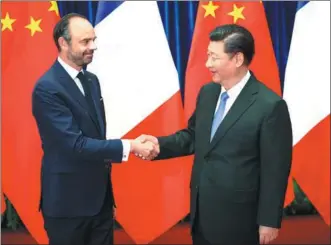  ?? FENG YONGBIN / CHINA DAILY ?? President Xi Jinping meets French Prime Minister Edouard Philippe at the Great Hall of the People in Beijing on Monday. Xi said China appreciate­s France’s proactive participat­ion in building the Belt and Road.