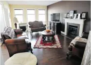  ??  ?? The 3,000-square-foot home in Fort Saskatchew­an provides plenty of room for the family of four.