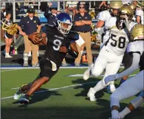  ??  ?? Rochester’s Alex Bueno takes off toward the line of scrimmage in the first half of an OAA crossover game against cross-town rival Stoney Creek on Thursday.