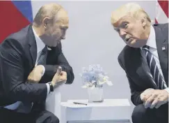  ??  ?? 0 President Trump with his Russian counterpar­t Vladimir Putin