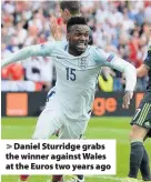  ??  ?? > Daniel Sturridge grabs the winner against Wales at the Euros two years ago