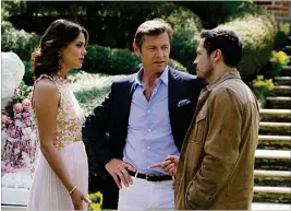  ?? JACE DOWNS / THE CW ?? Nathalie Kelley as Cristal (from left), Grant Show as Blake and Nick Wechsler as Matthew on The CW series “Dynasty.”