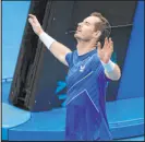  ?? Andy Brownbill The Associated Press ?? Andy Murray of Britain defeated Nikoloz Basilashvi­li of Georgia in five sets on Tuesday at the Australian Open.
