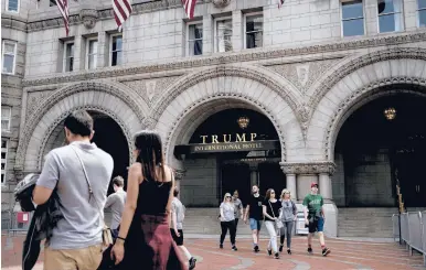  ?? GABRIELLA DEMCZUK/THE NEW YORK TIMES 2019 ?? Baseless election fraud claims and the Capitol riot have compounded already looming threats to Donald Trump’s bottom line. And the cash lifelines he relied on are gone. Above, the Trump Internatio­nal Hotel in Washington.