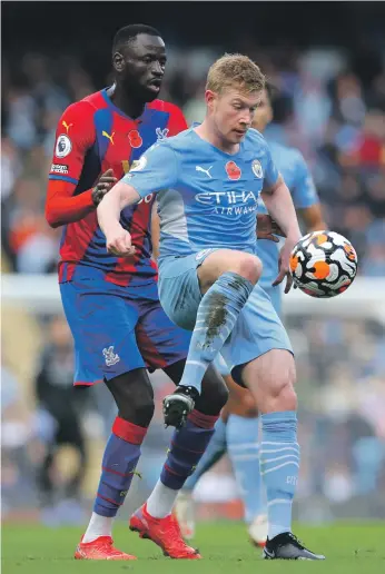  ?? Getty ?? Kevin de Bruyne, right, was substitute­d during last weekend’s home defeat against Crystal Palace but City manager Pep Guardiola insists the midfielder ‘has our complete support’