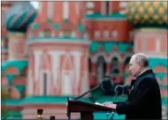  ?? MIKHAIL METZEL, SPUTNIK ?? Russian President Vladimir Putin delivers his speech during the Victory Day military parade in Moscow, Russia, on May 9, 2021, marking the 76th anniversar­y of the end of World War II in Europe.