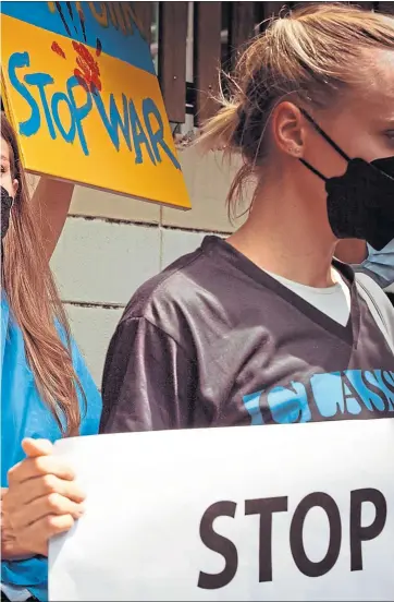  ?? Picture ?? Protesters holding a poster Vladimir Putin as Hitler gather outside Russia’s Embassy in Bangkok, Thailand to denounce invasion of Ukraine
Mailee Osten-tan