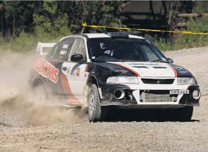  ?? PHOTO: JOHN COSGROVE ?? Double tap . . . Carter Strang of Wallacetow­n, gained his second successive victory in the Rankleburn Rally in West Otago on Saturday.