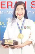 ??  ?? Keoh Lay Khuan, winner of the Dedicated Teacher Award (Female) at the MILORMinis­try of Education-MSSM SPORTS AWARD 2018.