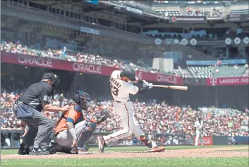  ?? JOSE CARLOS FAJARDO — BAY AREA NEWS GROUP ?? San Francisco Giants’ Kris Bryant (23) connects for a solo home run in the third inning of their game at Oracle Park in San Francisco on Aug. 1.