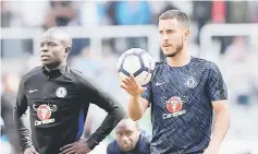  ??  ?? File photo shows Chelsea’s Eden Hazard (right) and N’Golo Kante warm up before a Premier League match. — Reuters photo