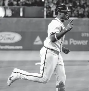  ?? ASHLEY LANDIS/AP ?? Jorge Soler rounds the bases after belting a home run in the seventh inning that put Atlanta ahead in its 3-2 victory over Houston in World Series Game 4 on Saturday night.