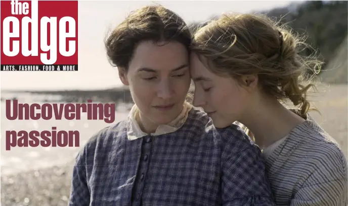  ??  ?? BY THE SEA: Kate Winslet and Saoirse Ronan, from left, find romance by the shore in ‘Ammonite,’ set in 1840s England.