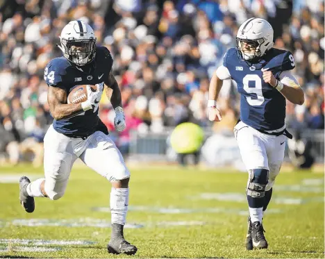  ?? SCOTT TAETSCH/GETTY IMAGES ?? Penn State's Miles Sanders, left, and Trace McSorley, right, will participat­e in this month's NFL combine in Indianapol­is.