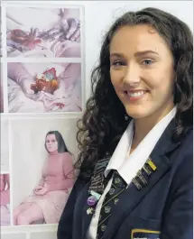  ?? PHOTO: MARGOT NEAS ?? Top student . . . Former Wakatipu High School pupil Meg Jolly (18) with some of her work, featuring her sister Bella (16).