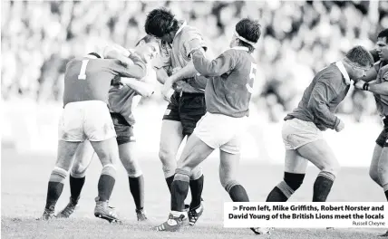  ?? Russell Cheyne ?? > From left, Mike Griffiths, Robert Norster and David Young of the British Lions meet the locals