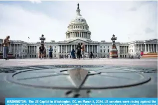  ?? — AFP ?? WASHINGTON: The US Capitol in Washington, DC, on March 8, 2024. US senators were racing against the clock March 8 to vote on a package of funding bills for key federal agencies to avert a partial government shutdown ahead of a midnight deadline.