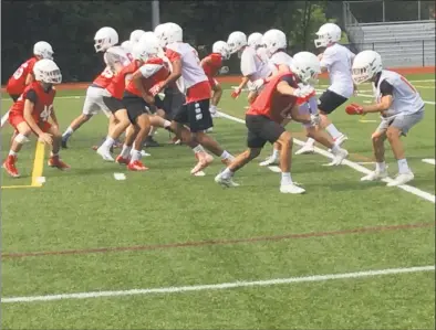  ?? David Fierro / Hearst Connecticu­t Media ?? Spring football took place at Greenwich High School for two weeks. The Cardinals played their annual Red and White game on Saturday at Cardinal Stadium.