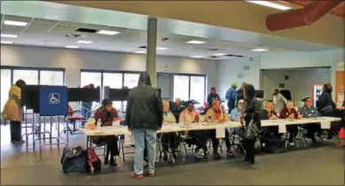  ?? FILE PHOTO ?? Troy residents show up to vote on Election Day in 2017at Knickerbac­ker Ice Arena.