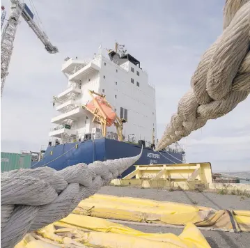  ?? JACQUES BOISSINOT / THE CANADIAN PRESS ?? The M/V Asterix sits at Davie Shipbuildi­ng in Lévis, Que., awaiting conversion to a tanker supply vessel for the
Royal Canadian Navy. The new Liberal government has put those plans on hold, at least temporaril­y.