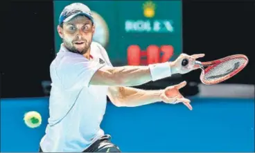  ?? AFP ?? Russia's Aslan Karatsev defeated Bulgaria’s Grigor Dimitrov on Tuesday to set up a semi-final clash with Novak Djokovic.