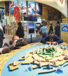  ?? Ahmed Ramzan/ Gulf News ?? People experience the VR of Sir Bani Yas Island at Abu Dhabi stand, on the third day of Arabian Travel Market 2018 at Dubai World Trade Centre yesterday.