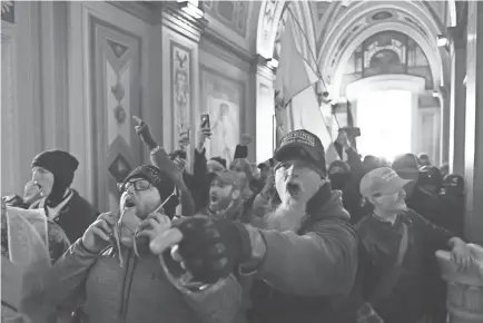  ?? ROBERTO SCHMIDT/AFP VIA GETTY IMAGES ?? Rioters breached the U.S. Capitol in Washington, D.C., on Wednesday.