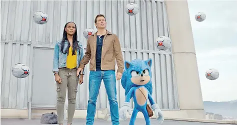  ??  ?? ‘Sonic the Hedgehog’ features, from left, Tika Sumpter, James Marsden and, in the role of the CGI title character, Ben Schwartz.