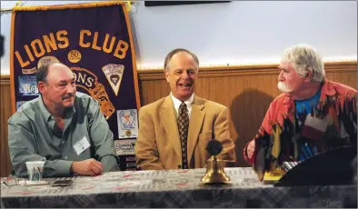  ?? Ernest A. Brown photo ?? Burrillvil­le Lions Club President Richard Nolan, right, chats with Burrillvil­le Town Manager Michael C. Wood, left, and North Smithfield Town Administra­tor Gary Ezovski, center, before the start of the monthly club meeting at Uncle Ronnie’s Red Tavern in Burrillvil­le Wednesday. Both Wood and Ezovski presented their state of the town addresses during the meeting, attended by about 30 local residents and Lions Club members.