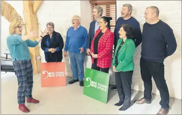  ?? ?? Lisa Dunphy, Musical Advisor (left) with the One Town One Voice initiative getting singers into their swing at the Mill, Castletown­roche this week to launch the collaborat­ion with the Avondhu Blackwater Partnershi­p.