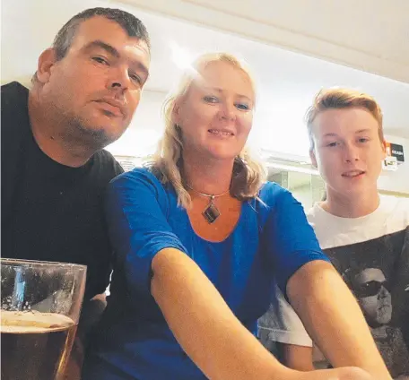  ??  ?? Oxenford car crash victim Jasey Grant with his stepfather Scott Dowton and mother Erryn Grant.